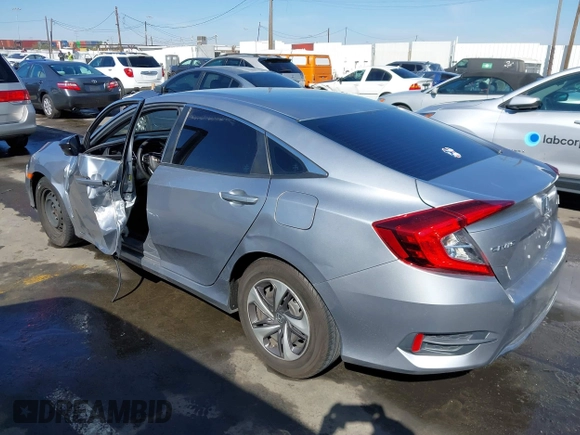 2020 Honda Civic LX with VIN 2HGFC2F6XLH533726, listed as a IAAI auction lot 41633882 with 141,835 mi miles and . Bid and sale history available at DreamBid. Image 3.
