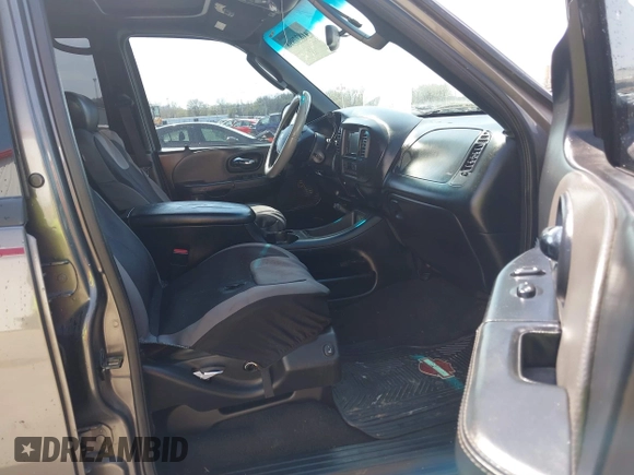 2002 Ford F-150 Harley Davidson with VIN 1FTRW07392KE11409, listed as a IAAI auction lot 41877998 with 148,476 mi miles. Bid and sale history available at carsss.com. Image 5.