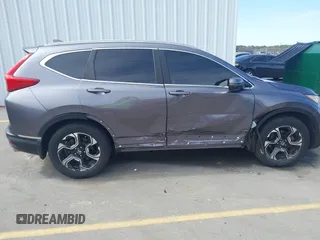2018 Honda CR-V Touring with VIN 7FARW1H9XJE018575, listed as a IAAI auction lot 41747192 with 83,699 mi miles and . Bid and sale history available at carsss.com. Image 13.