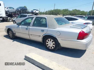 2004 Mercury Grand Marquis LS Premium with VIN 2MEFM75W04X659688, listed as a IAAI auction lot 42026540 with 144,088 mi miles and . Bid and sale history available at DreamBid. Image 3.