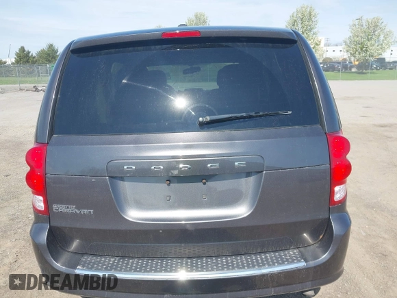 2015 Dodge Grand Caravan SE with VIN 2C4RDGBG2FR684367, listed as a IAAI auction lot 42167621 with 216,628 mi miles and . Bid and sale history available at DreamBid. Image 16.