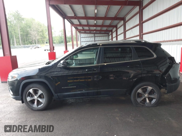 2019 Jeep Cherokee Limited with VIN 1C4PJMDX7KD137829, listed as a IAAI auction lot 42437417 with 143,214 mi miles and . Bid and sale history available at DreamBid. Image 14.