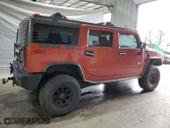 2003 Hummer H2 z VIN 5GRGN23U93H138182, wystawiony jako Copart lot #51842085 z przebiegiem 170 659 mil mil oraz Tytuł czysty. Historia ofert i sprzedaży dostępna na DreamBid. Obrazek 3.
