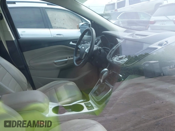 2013 Ford Escape SEL with VIN 1FMCU9H90DUC52981, listed as a IAAI auction lot 42506500 with 74,212 mi miles and . Bid and sale history available at DreamBid. Image 5.