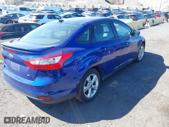 2012 Ford Focus SE with VIN 1FAHP3F27CL248182, listed as a IAAI auction lot 41875527 with 105,075 mi miles. Bid and sale history available at carsss.com. Image 4.