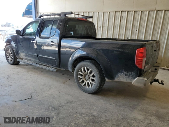2009 Nissan Frontier LE with VIN 1N6AD09U79C409698, listed as a Copart auction lot 55843545 with 230,334 mi miles and Salvage title. Bid and sale history available at DreamBid. Image 2.