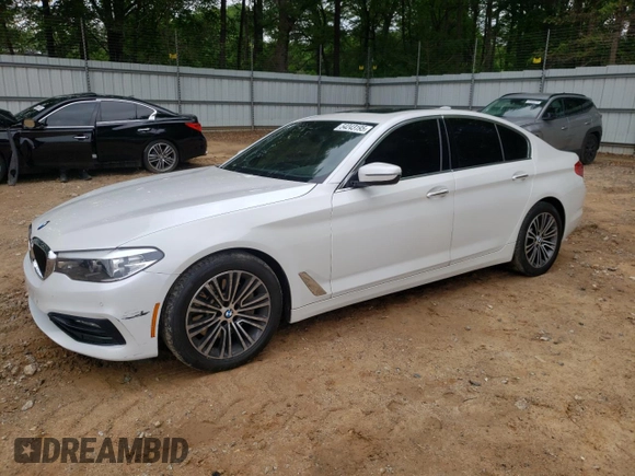 2018 BMW 5 Series 530i with VIN WBAJA5C53JG898430, listed as a Copart auction lot 54243195 with 129,854 mi miles and Salvage title. Bid and sale history available at DreamBid. Image 1.