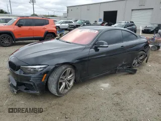2015 BMW 4 Series 435i with VIN WBA3R1C5XFK193302, listed as a Copart auction lot 87801245 with 54,069 mi miles and Salvage Title. Bid and sale history available at carsss.com. Image 1.