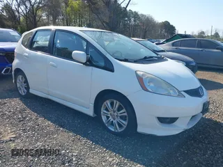 2009 Honda Fit Sport w/Navi with VIN JHMGE88609C002848, listed as a IAAI auction lot 42121403 with 168,138 mi miles. Bid and sale history available at carsss.com. Image 1.