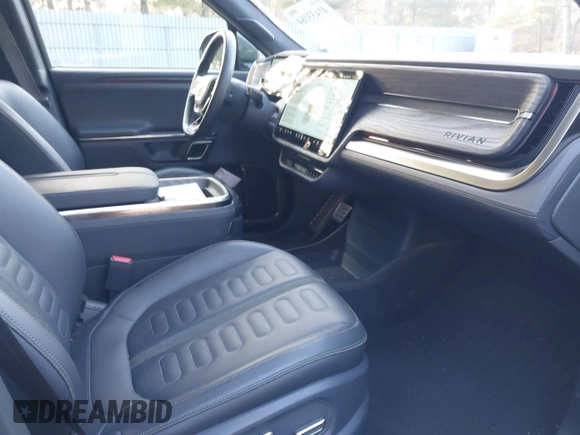 2022 Rivian R1S Launch Edition with VIN 7PDSGABL4NN000409, listed as a IAAI auction lot 41433164 with 39,603 mi miles. Bid and sale history available at carsss.com. Image 5.