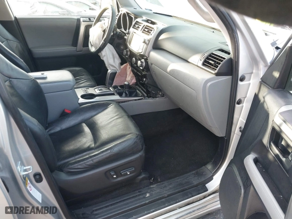 2012 Toyota 4Runner SR5 with VIN JTEBU5JR6C5102512, listed as a IAAI auction lot 41291233 with 164,476 mi miles. Bid and sale history available at carsss.com. Image 5.