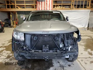 2013 Jeep Grand Cherokee Overland with VIN 1C4RJFCT5DC599866, listed as a Copart auction lot 51837395 with 105,521 mi miles and Salvage Title. Bid and sale history available at carsss.com. Image 5.