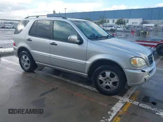 2002 Mercedes-Benz M-Class with VIN 4JGAB54EX2A358989, listed as a IAAI auction lot 41741848 with 181,697 mi miles. Bid and sale history available at carsss.com. Image 1.