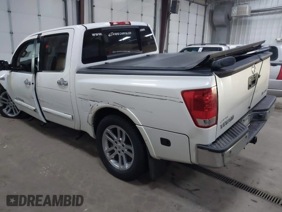 2014 Nissan Titan S with VIN 1N6AA0EC1EN504617, listed as a IAAI auction lot 41633861 with 65,047 mi miles. Bid and sale history available at carsss.com. Image 3.