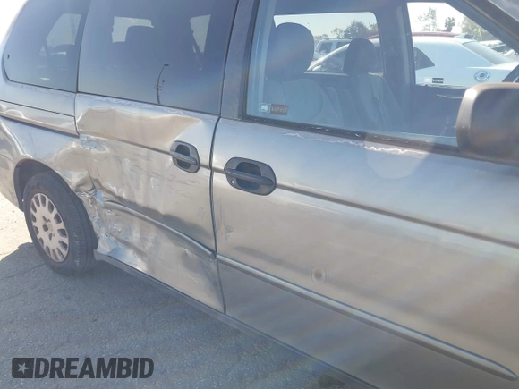 2002 Honda Odyssey LX z VIN 2HKRL18542H553437, wystawiony jako IAAI lot #41824481 z przebiegiem 222 428 mil mil oraz . Historia ofert i sprzedaży dostępna na DreamBid. Obrazek 12.
