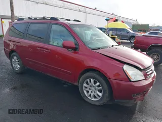2006 Kia Sedona LX with VIN KNDMB233X66030979, listed as a IAAI auction lot 41933430 with 127,305 mi miles and . Bid and sale history available at DreamBid. Image 1.