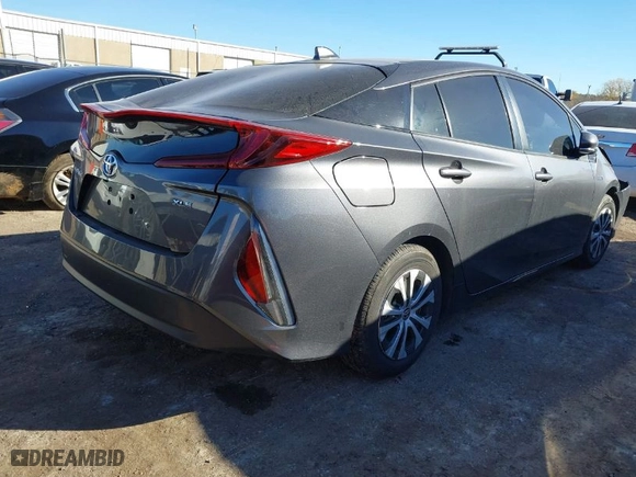 2021 Toyota Prius Prime LE with VIN JTDKAMFP4M3178919, listed as a IAAI auction lot 40902821 with 43,647 mi miles. Bid and sale history available at carsss.com. Image 4.