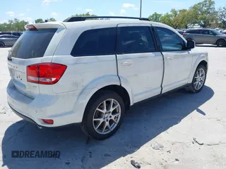 2014 Dodge Journey SXT with VIN 3C4PDCBG4ET235848, listed as a IAAI auction lot 41824155 with 48,691 mi miles and . Bid and sale history available at DreamBid. Image 4.