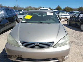 2006 Toyota Camry LE z VIN 4T1BF32K76U631283, wystawiony jako IAAI lot #41828021 z przebiegiem 332 063 mil mil oraz . Historia ofert i sprzedaży dostępna na DreamBid. Obrazek 12.