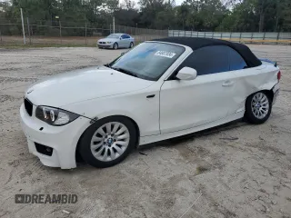 2011 BMW 1 Series 128i with VIN WBAUL7C55BVM79611, listed as a Copart auction lot 84807934 with 161,099 mi miles and Salvage Title. Bid and sale history available at carsss.com. Image 1.