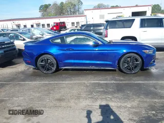 2016 Ford Mustang EcoBoost z VIN 1FA6P8TH0G5206167, wystawiony jako IAAI lot #41833768 z przebiegiem 101 181 mil mil oraz . Historia ofert i sprzedaży dostępna na DreamBid. Obrazek 13.