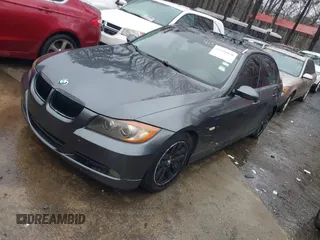 2007 BMW 3 Series 328i with VIN WBAVA37577NE29557, listed as a IAAI auction lot 41518808 with 200,966 mi miles and . Bid and sale history available at DreamBid. Image 2.