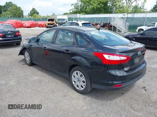 2012 Ford Focus SE z VIN 1FAHP3F26CL157551, wystawiony jako IAAI lot #42697232 z przebiegiem 135 024 mil mil oraz . Historia ofert i sprzedaży dostępna na DreamBid. Obrazek 3.