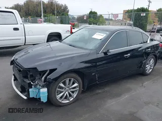 2015 Infiniti Q50 z VIN JN1BV7AP3FM336566, wystawiony jako IAAI lot #42349544 z przebiegiem 84 077 mil mil oraz . Historia ofert i sprzedaży dostępna na DreamBid. Obrazek 19.