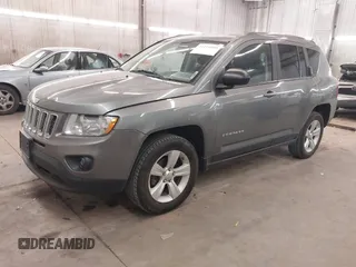 2013 Jeep Compass Sport with VIN 1C4NJDBBXDD225517, listed as a IAAI auction lot 41271099 with 168,204 mi miles. Bid and sale history available at carsss.com. Image 18.