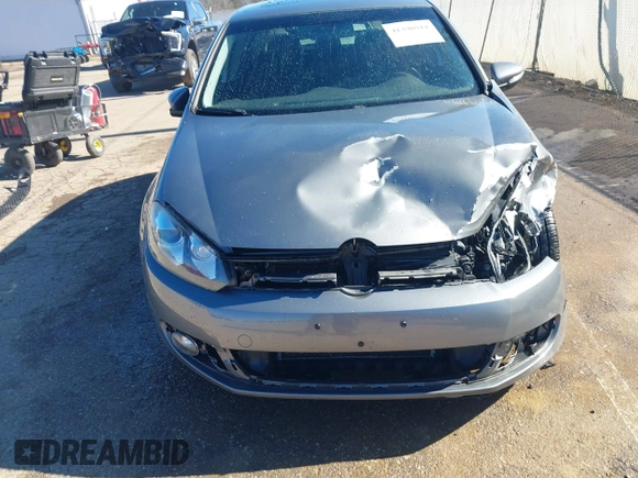 2013 Volkswagen Golf TDI z VIN WVWDM7AJ0DW137139, wystawiony jako IAAI lot #41390911 z przebiegiem 88 693 mil mil oraz . Historia ofert i sprzedaży dostępna na DreamBid. Obrazek 6.