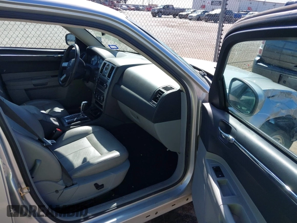 2006 Chrysler 300 Touring with VIN 2C3KA53G86H111027, listed as a IAAI auction lot 41870312 with 59,870 mi miles. Bid and sale history available at carsss.com. Image 5.