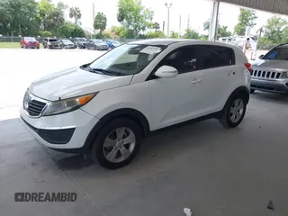 2013 Kia Sportage LX z VIN KNDPB3A2XD7521010, wystawiony jako IAAI lot #42297975 z przebiegiem 134 826 mil mil oraz . Historia ofert i sprzedaży dostępna na DreamBid. Obrazek 18.