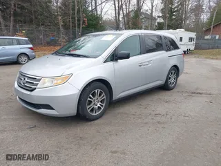 2011 Honda Odyssey EX-L with VIN 5FNRL5H65BB047291, listed as a IAAI auction lot 42094374 with 200,372 mi miles. Bid and sale history available at carsss.com. Image 17.