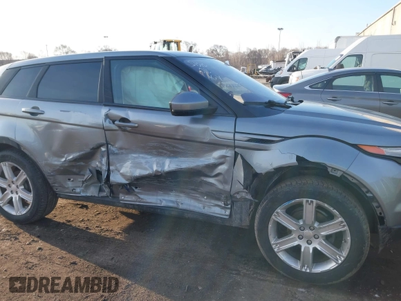 2014 Land Rover Range Rover Evoque Pure Plus z VIN SALVP2BG0EH863440, wystawiony jako IAAI lot #41760065 z przebiegiem 136 997 mil mil oraz . Historia ofert i sprzedaży dostępna na DreamBid. Obrazek 6.