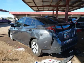 2018 Toyota Prius Two with VIN JTDKARFUXJ3062963, listed as a IAAI auction lot 41588989 with 114,842 mi miles. Bid and sale history available at carsss.com. Image 3.