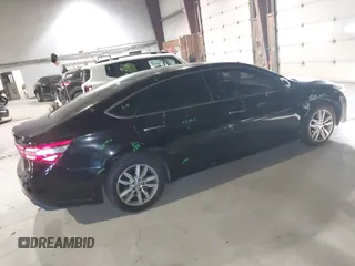 2014 Toyota Avalon Limited with VIN 4T1BK1EB0EU114093, listed as a IAAI auction lot 41311332 with 103,479 mi miles and . Bid and sale history available at DreamBid. Image 4.