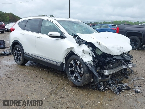 2018 Honda CR-V Touring z VIN 5J6RW1H96JL014087, wystawiony jako IAAI lot #41931640 z przebiegiem Nie podano mil oraz . Historia ofert i sprzedaży dostępna na DreamBid. Obrazek 1.