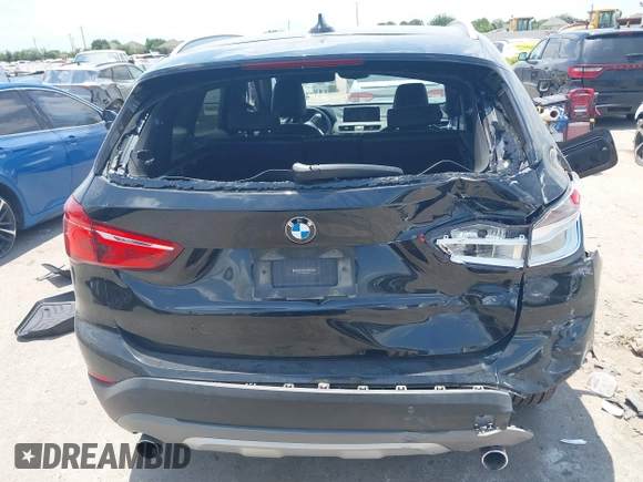 2017 BMW X1 xDrive28i with VIN WBXHT3Z30H4A65417, listed as a IAAI auction lot 42328797 with 103,788 mi miles and . Bid and sale history available at DreamBid. Image 16.