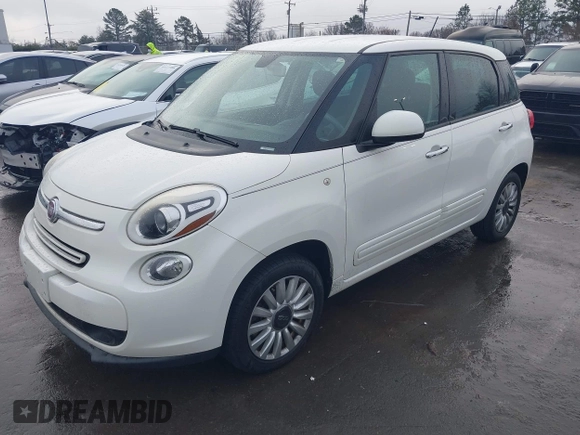 2014 FIAT 500L Easy with VIN ZFBCFABH8EZ025450, listed as a IAAI auction lot 41429105 with 199,200 mi miles and . Bid and sale history available at DreamBid. Image 2.