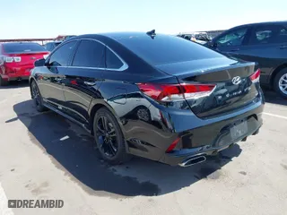 2019 Hyundai Sonata Sport with VIN 5NPE34AF2KH792374, listed as a IAAI auction lot 41987740 with 77,209 mi miles. Bid and sale history available at carsss.com. Image 3.
