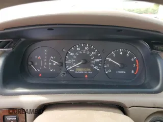 1997 Toyota Camry LE z VIN 4T1BG22KXVU163880, wystawiony jako Copart lot #56741295 z przebiegiem 132 863 mil mil oraz Szkody całkowita. Historia ofert i sprzedaży dostępna na DreamBid. Obrazek 9.