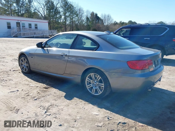 2012 BMW 3 Series 335i xDrive with VIN WBAKF9C5XCE620684, listed as a IAAI auction lot 41341828 with 154,809 mi miles. Bid and sale history available at carsss.com. Image 3.