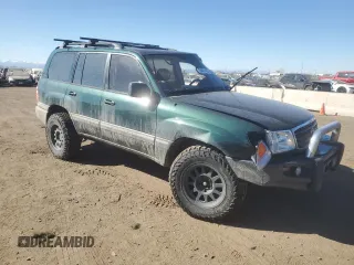 1999 Toyota Land Cruiser with VIN JT3HT05J1X0058581, listed as a Copart auction lot 46714255 with 229,128 mi miles and Salvage Title. Bid and sale history available at carsss.com. Image 4.