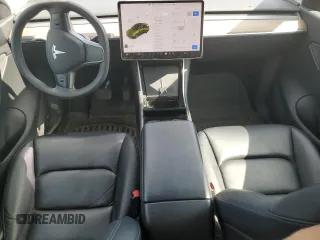 2021 Tesla Model Y Long Range z VIN 5YJYGDEE4MF085975, wystawiony jako Copart lot #58838485 z przebiegiem 72 550 mil mil oraz Szkoda całkowita • Salvage title. Historia ofert i sprzedaży dostępna na DreamBid. Obrazek 8.