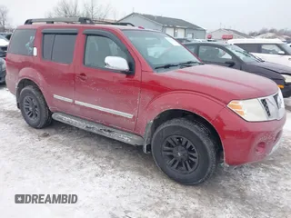 2010 Nissan Pathfinder SE with VIN 5N1AR1NB0AC614147, listed as a IAAI auction lot 41311543 with 211,710 mi miles and . Bid and sale history available at DreamBid. Image 1.