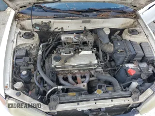 1997 Mitsubishi Mirage LS z VIN JA3AY31C1VU009019, wystawiony jako Copart lot #74227544 z przebiegiem 243 967 mil mil oraz Szkoda całkowita • Salvage title. Historia ofert i sprzedaży dostępna na DreamBid. Obrazek 11.