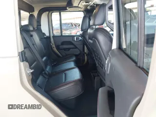 2022 Jeep Gladiator Rubicon with VIN 1C6JJTBG2NL164117, listed as a IAAI auction lot 42450350 with 22,326 mi miles and . Bid and sale history available at DreamBid. Image 8.