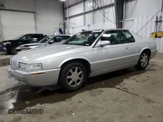 2001 Cadillac Eldorado Touring ETC z VIN 1G6ET12931B109107, wystawiony jako Copart lot #52251925 z przebiegiem 150 880 mil mil oraz Szkody całkowita. Historia ofert i sprzedaży dostępna na DreamBid. Obrazek 1.