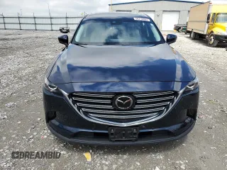 2021 Mazda CX-9 Touring with VIN JM3TCACY7M0511939, listed as a Copart auction lot 56715985 with 44,305 mi miles and Salvage title. Bid and sale history available at DreamBid. Image 5.
