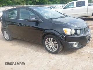 2012 Chevrolet Sonic LT with VIN 1G1JC6SH2C4194182, listed as a IAAI auction lot 42410121 with 163,953 mi miles and . Bid and sale history available at DreamBid. Image 1.
